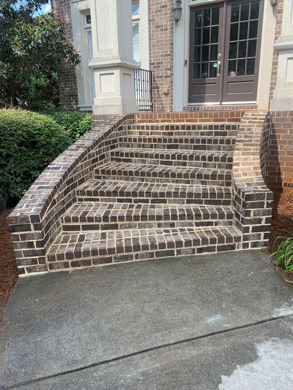 Brick entry steps with side walls in North Atlanta, GA by Escobar Masonry & Hardscapes