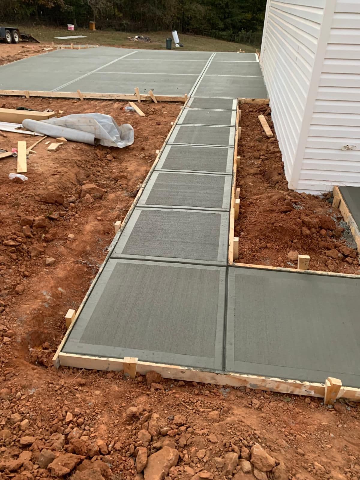 Concrete walkway in North Atlanta by Escobar Masonry & Hardscapes