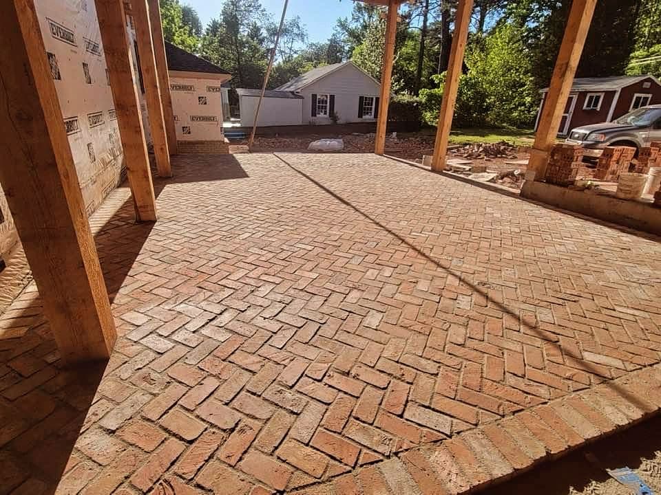 Custom hardscape with paver patio and fire pit in North Atlanta by Escobar Masonry & Hardscapes