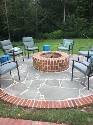 Custom hardscape with paver patio and fire pit in North Atlanta by Escobar Masonry